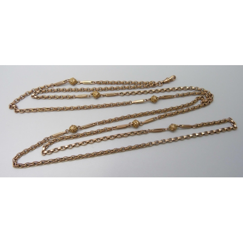 7069 - A 9ct gold fancy link long guard chain necklace, 26.6g, 142cm