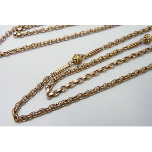 7069 - A 9ct gold fancy link long guard chain necklace, 26.6g, 142cm