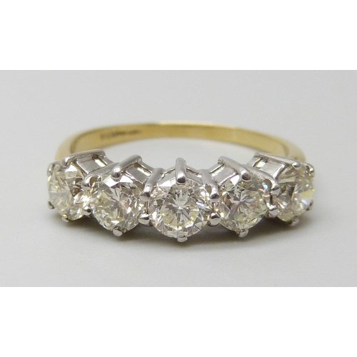 7076 - An 18ct gold five stone diamond ring, diamond weight estimated 1.50ct, stamped DIA, London hallmark,... 