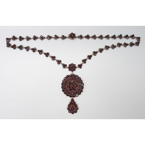 7081 - A Bohemian garnet cluster necklace, 22g, pendant 5cm, chain 40cm