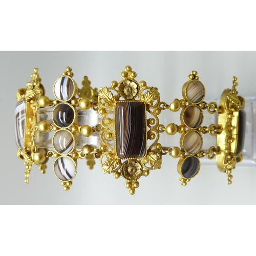 7089 - An early Victorian gilt metal and agate set panel bracelet, largest panels 2.4 x 4.5cm