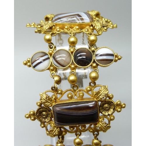 7089 - An early Victorian gilt metal and agate set panel bracelet, largest panels 2.4 x 4.5cm