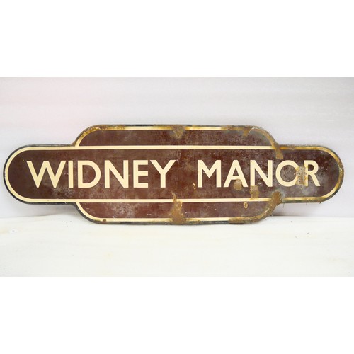 9017 - A fully flanged totem station sign BR(M) WIDNEY MANOR. Original paint with some paint loss/wear. To ... 