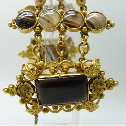 7089 - An early Victorian gilt metal and agate set panel bracelet, largest panels 2.4 x 4.5cm