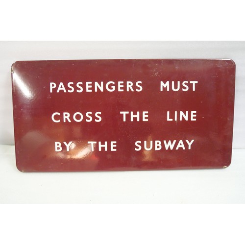 9025 - BR(M) fully flanged enamel station railway sign inscribed PASSENGERS MUST CROSS THE LINE BY THE SUBW... 