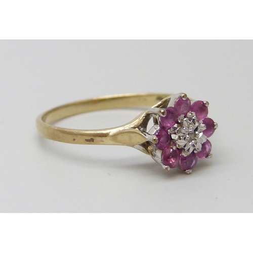 7091 - A 9ct gold ruby and diamond ring, 1.3g, N