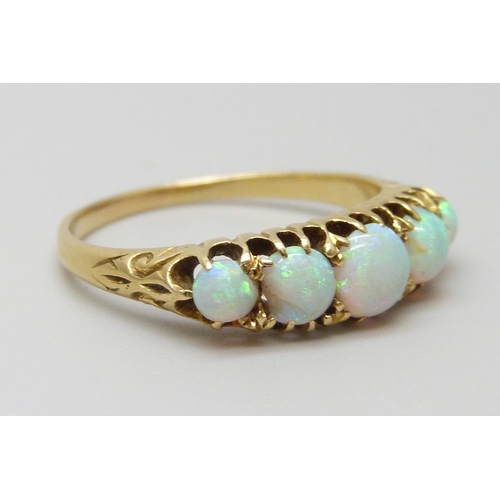 7093 - A yellow metal five stone opal ring, one opal a/f (chipped), 3g, O