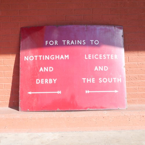 9035 - A large BR(M) enamel railway sign inscribed  TRAINS TO NOTTINGHAM AND DERBY and TRAINS TO LEICESTER ... 