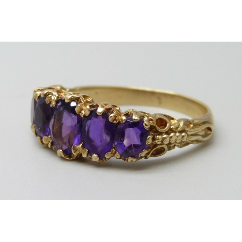 7096 - A 9ct gold and amethyst five stone ring, 4g, R/S