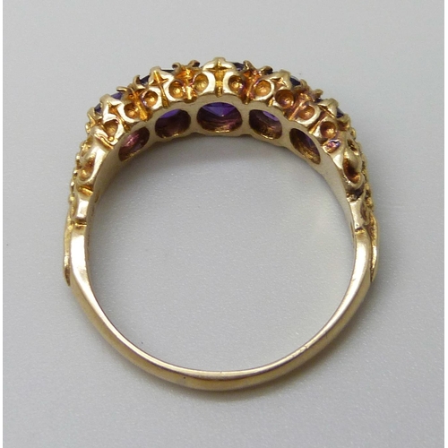 7096 - A 9ct gold and amethyst five stone ring, 4g, R/S