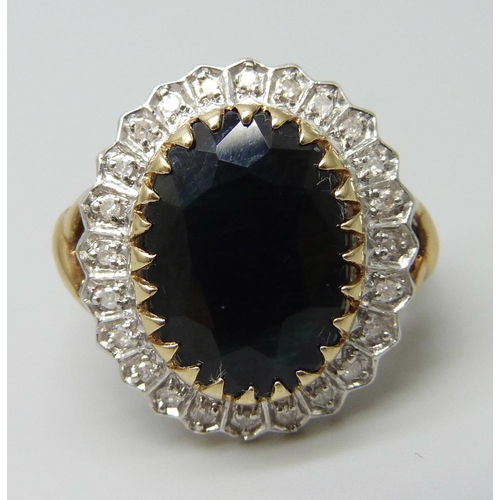 7100 - A 9ct gold, sapphire and diamond cluster ring, 4.9g, L