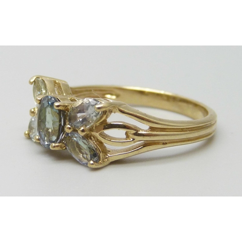 7102 - A 9ct gold light green and blue stone cluster ring, 3.2g, N