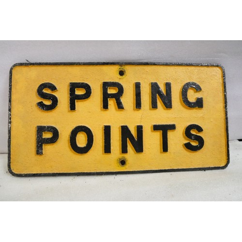 9067 - A cast iron railway sign SPRING POINTS. Measures 31 x 61cm HxW. To be sold with no reserve.