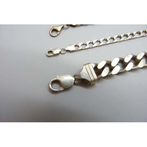 7116 - A silver curb link necklace and three silver bracelets, 155g, necklace 51cm and largest bracelet 23.... 