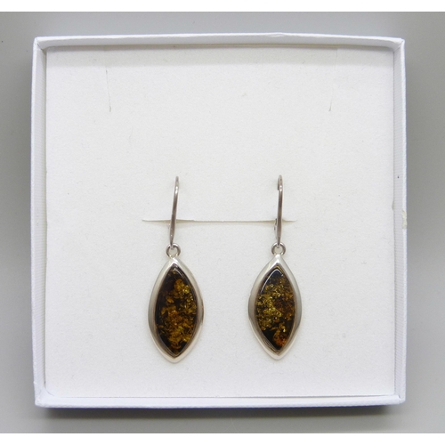 7119 - A pair of silver and green amber drop earrings, amber 2.3 x 1cm, 6.3g