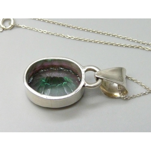 7122 - A silver handmade mystic topaz pendant on chain, 11.1g, 3.5cm