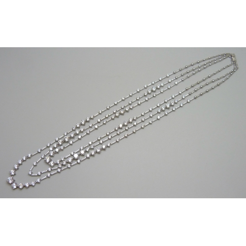 7137 - A 925 silver rhodium plated stone set 3 strand necklace set with Swarovski cubic zirconia, made by C... 