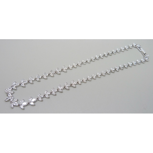 7138 - A silver necklace set with marquise cut cubic zirconia with a stone set clasp, 23.5g, 41cm