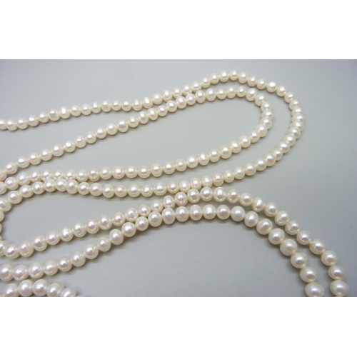 7139 - A very long string of cultured 6/7mm pearls, 64 inches, 96g