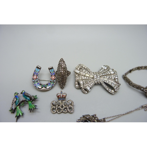 7159 - A collection of vintage jewellery including a silver marcasite set watch, a silver and enamel bird b... 