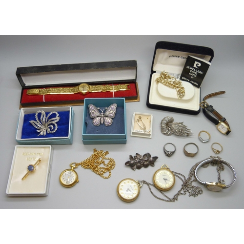 7165 - A collection of costume jewellery and wristwatches including two silver rings, etc.