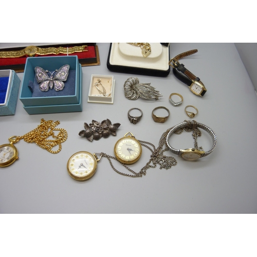 7165 - A collection of costume jewellery and wristwatches including two silver rings, etc.