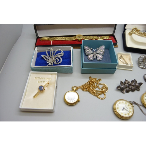 7165 - A collection of costume jewellery and wristwatches including two silver rings, etc.