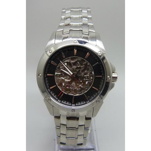 7173 - A Bulova wristwatch with skeleton dial, 45mm case