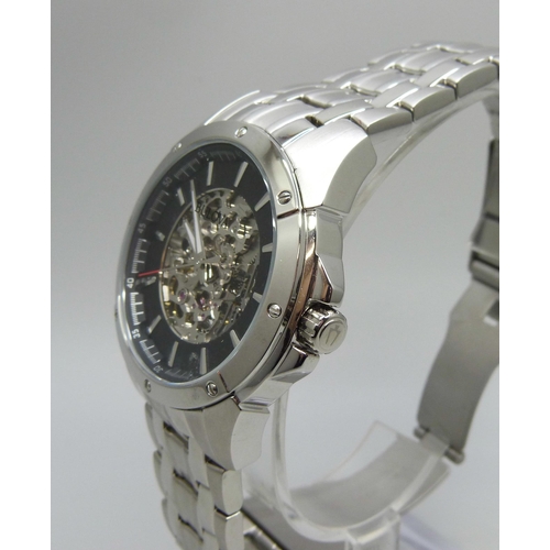 7173 - A Bulova wristwatch with skeleton dial, 45mm case