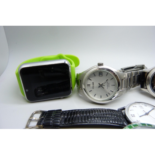 7194 - A collection of wristwatches including Armani Exchange, Timex, Police, Pulsar, etc.