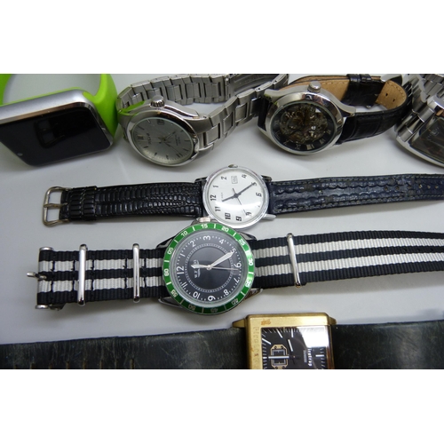 7194 - A collection of wristwatches including Armani Exchange, Timex, Police, Pulsar, etc.