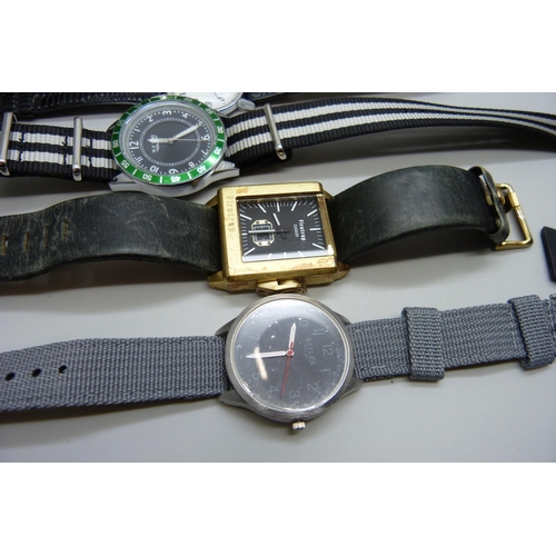 7194 - A collection of wristwatches including Armani Exchange, Timex, Police, Pulsar, etc.