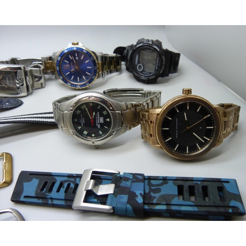 7194 - A collection of wristwatches including Armani Exchange, Timex, Police, Pulsar, etc.