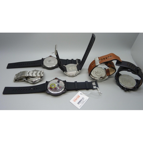 7195 - A collection of wristwatches including Diesel, Storm, Pulsar, etc.