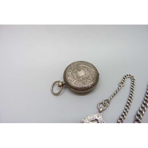 7214 - An .800 silver fob watch, a silver chain and silver fob (chain and fob a/f, 28g)