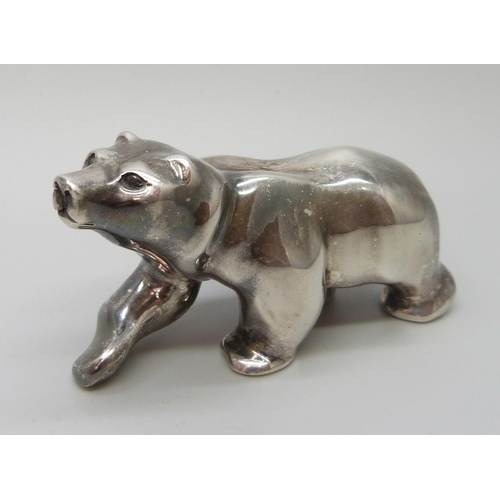 7216 - A hallmarked solid silver model of a bear, London 1995, 346g, 7.3 x 3.5cm