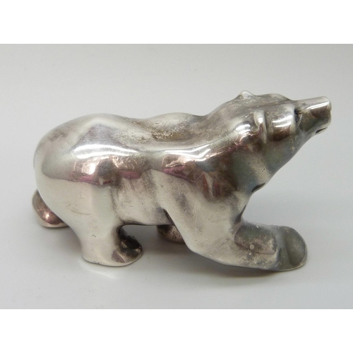 7216 - A hallmarked solid silver model of a bear, London 1995, 346g, 7.3 x 3.5cm