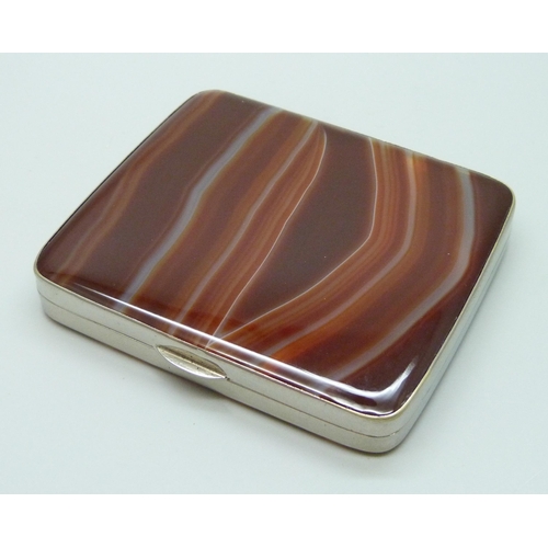 7217 - A white metal cigarette box set with two agate panels, 8.7 x 7.5cm, 138g