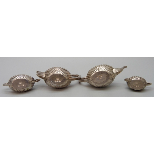 7219 - A silver miniature tea set, RRK, London 1975, 33g