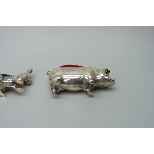 7228 - Two silver pin cushions, one in the form of a pig, the other a rabbit, 37g total weight, pig measure... 