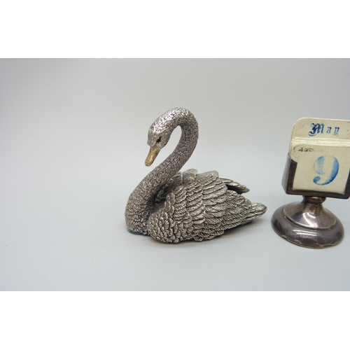 7229 - A silver covered model of a swan, hallmarked and stamped 'filled', a white metal propelling pencil s... 