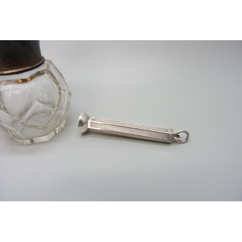 7230 - A silver and tortoiseshell topped scent bottle, with stopper, together with a TLM silver compact wit... 