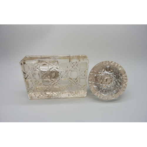 7236 - Two silver topped inkwells, ornate example Birmingham 1903, glass a/f on the other, 10.1 x 7.3cm