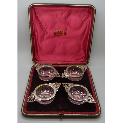 7239 - A set of four silver mounted cut glass salts, Birmingham 1899, 10cm, cased