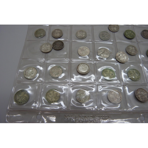 7241 - A collection of sixty-four 3d coins