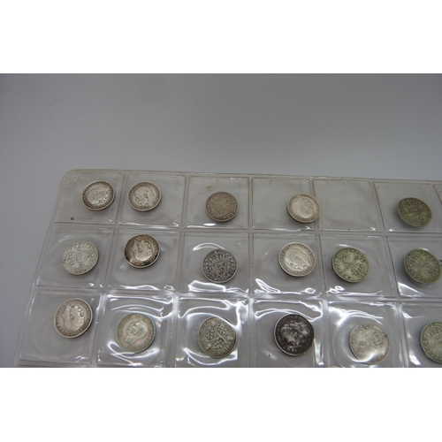 7241 - A collection of sixty-four 3d coins