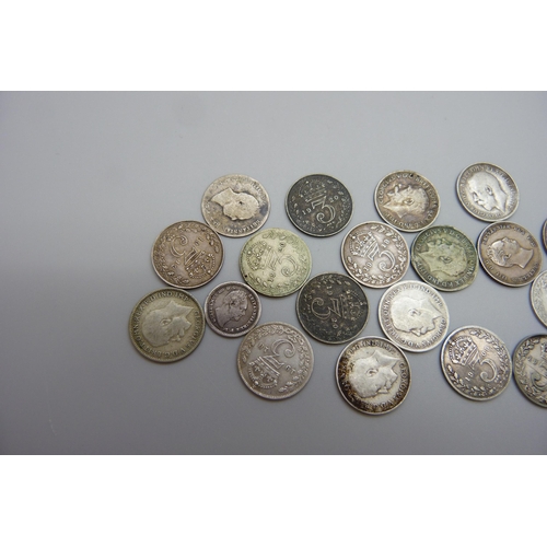 7243 - Three William IV coins including an 1834 1½ pence, and seventeen silver 3d coins