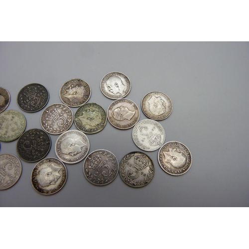 7243 - Three William IV coins including an 1834 1½ pence, and seventeen silver 3d coins