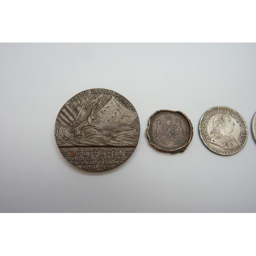 7286 - A Lusitania medallion, a Marie Theresia coin, an 1811 Bank Token and one other coin