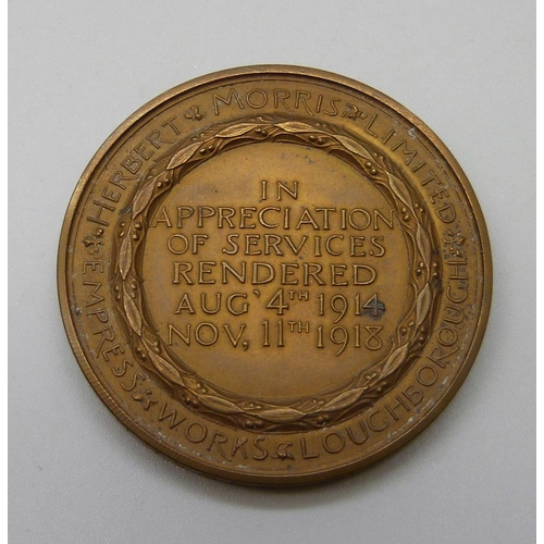 7297 - A WWI period commemorative medallion, Herbert Morris Limited, Empress Works Loughborough, 'Carry On'... 